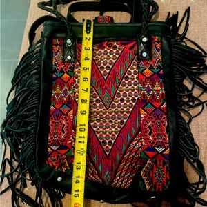 Black leather huipil bag backpack straps